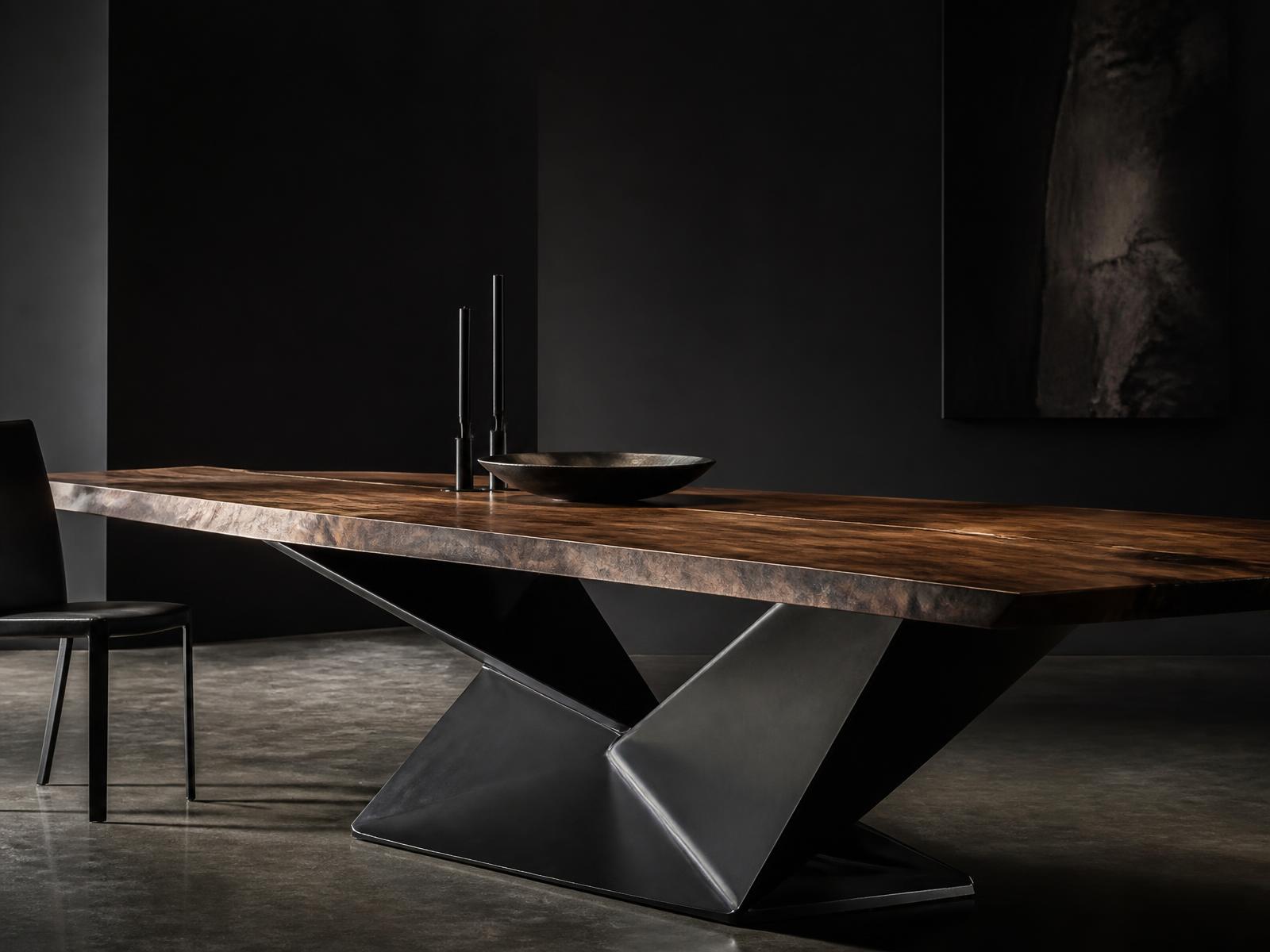 Bespoke architectural dining table with sculptural black steel base and solid wood top
